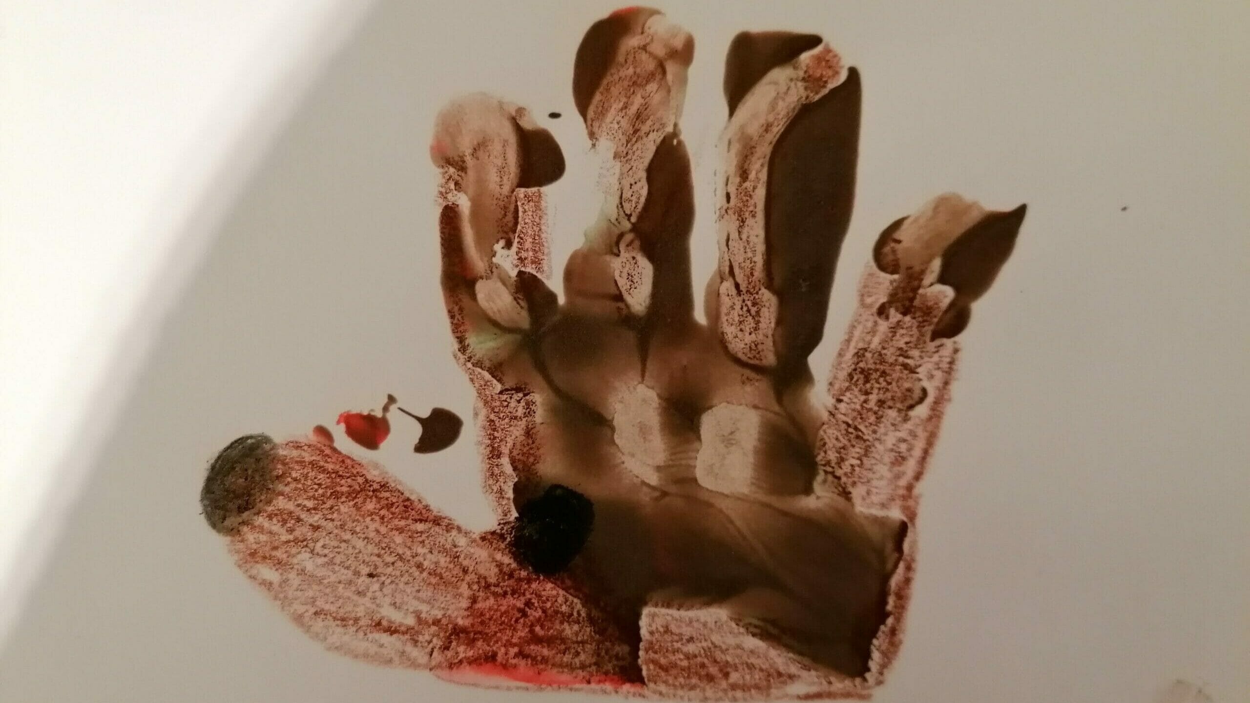 Handabruck mit Fingermalfarben, als Igel gestaltet